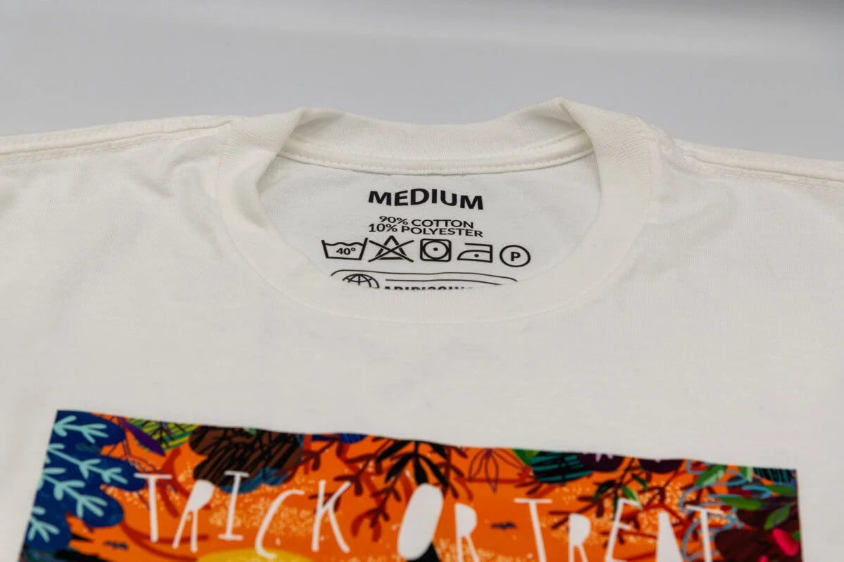 15. Relabel - And lastly, our favorite DTF printer idea. Relabeling garments just adds that next-level touch to a product, and it makes your tees officially ready for retail. It's also nice that you can run a few sheets of these and have them ready next time. 60 seconds on the cutting board, you can have your entire batch of labels ready to press for the entire order.