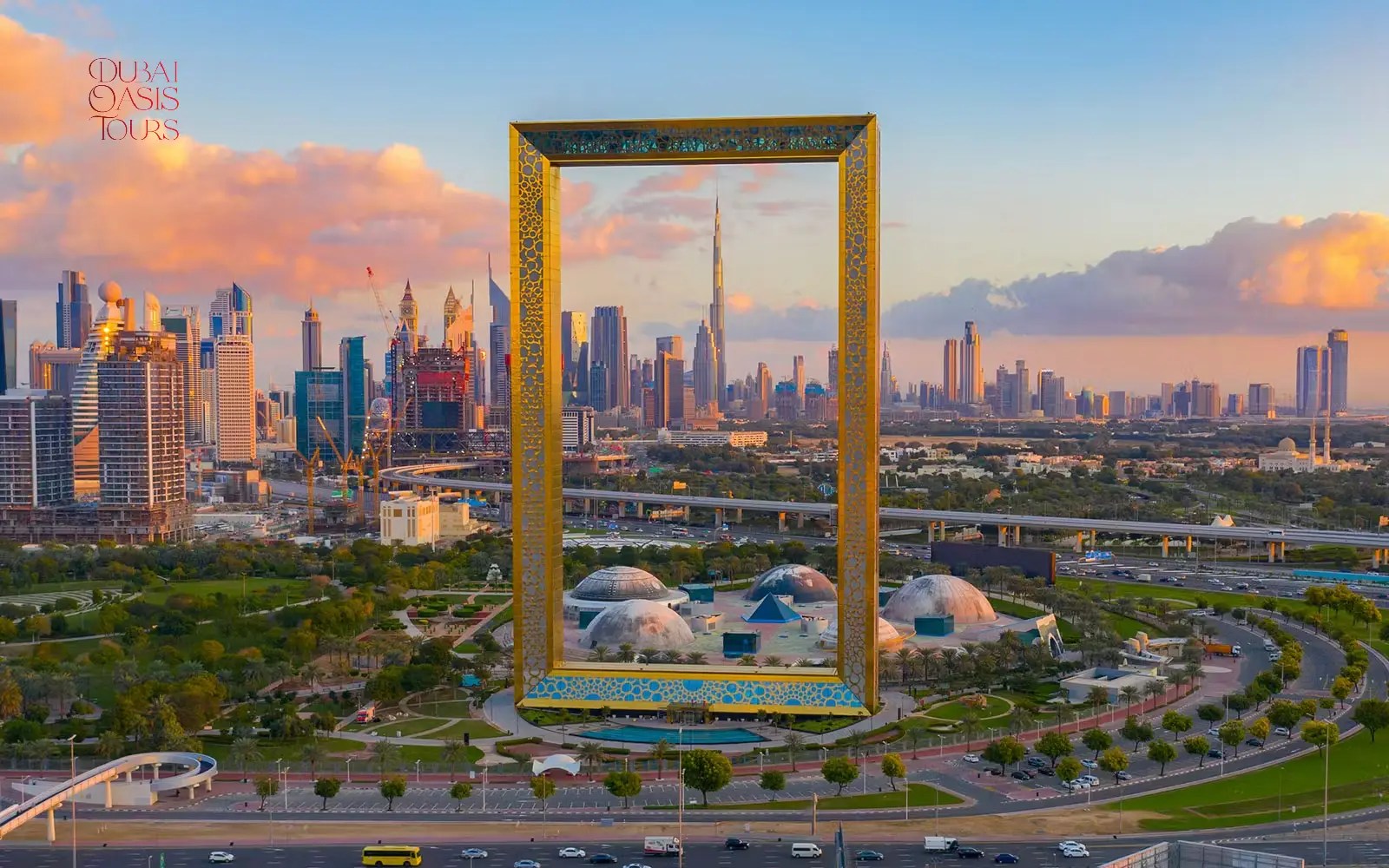Tourists walking on the glass bridge of Dubai Frame with skyline views