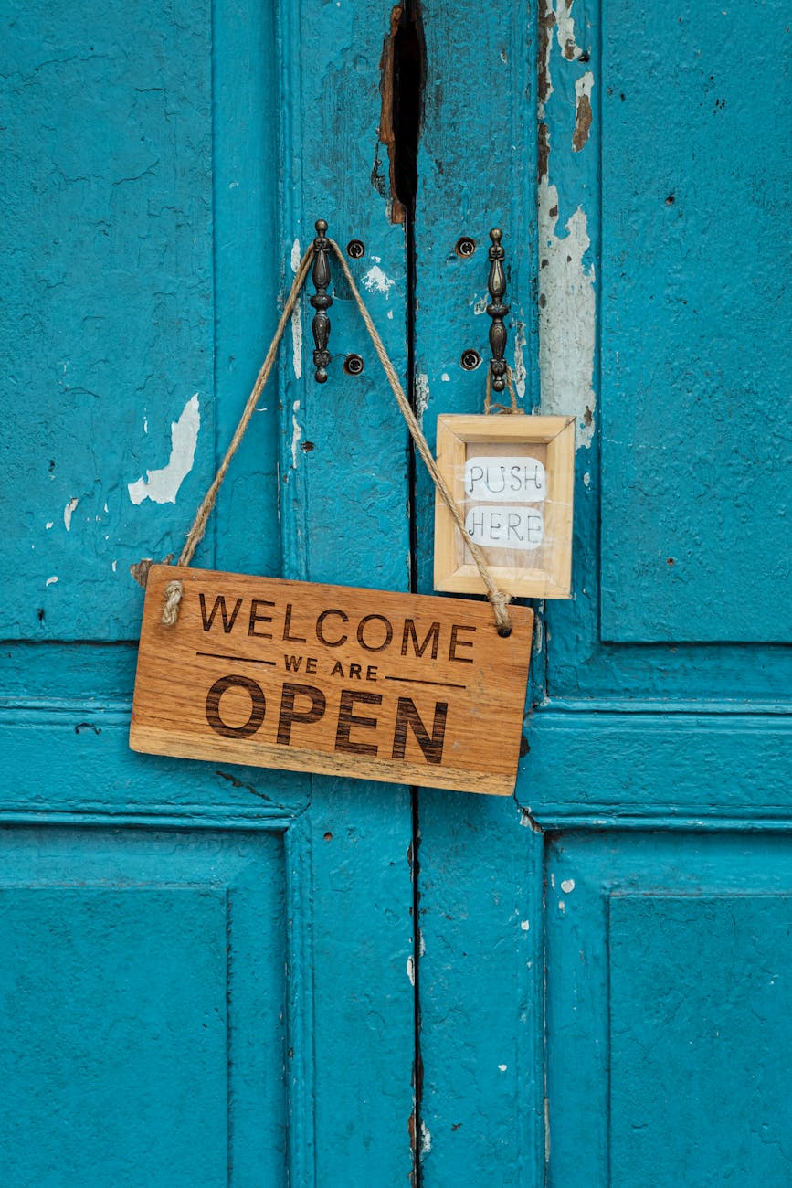 photo of wooden signage on doorknob