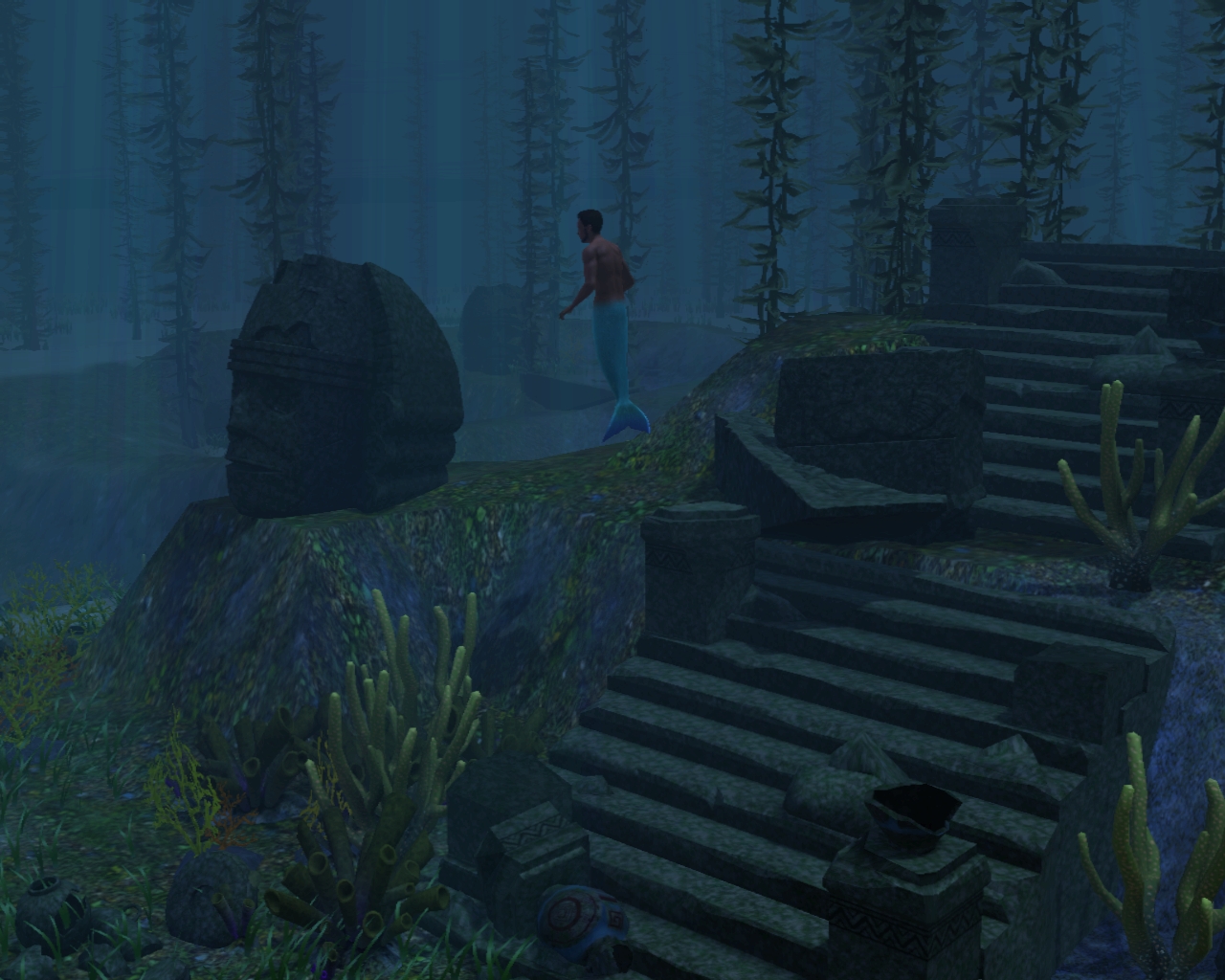 Mermaid underwater at dive site