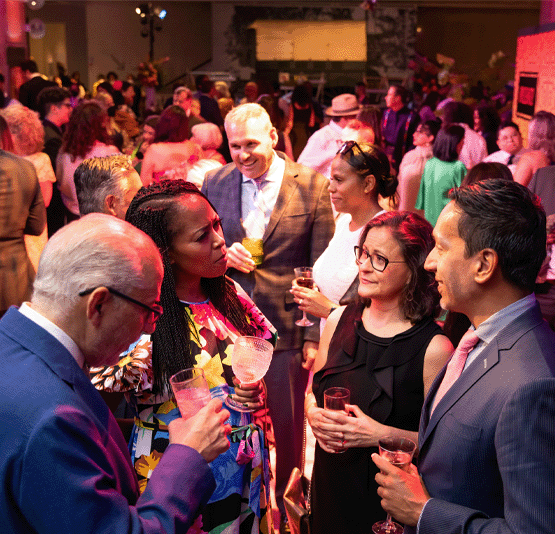 A crowd at the opening of the Molina Family Latino Gallery.