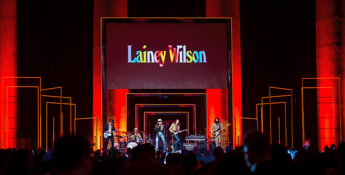Lainey Wilson performing at the Axios After Dark Presented by Live Nation event.