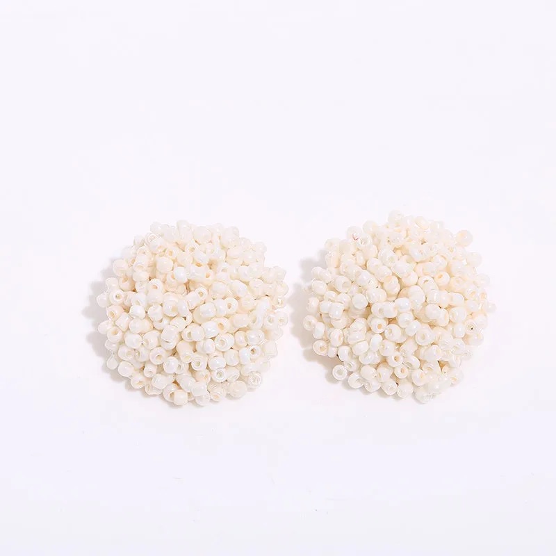 Aretes estilo botón de mullos tejidos