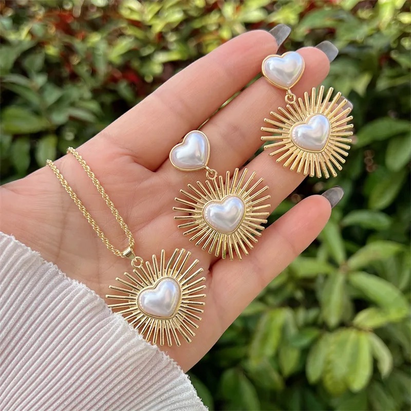 Set de corazones con mullos estilo perla