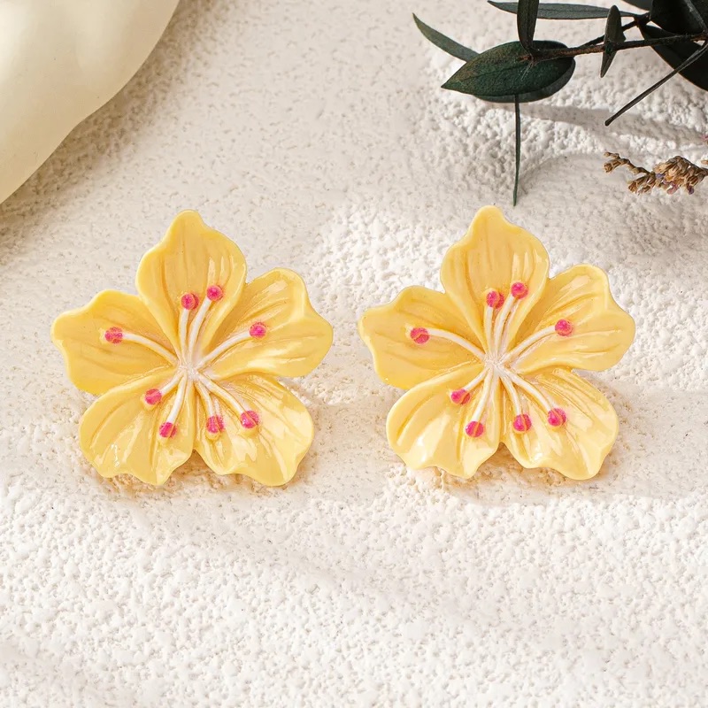 Aretes de flor amarillos retro