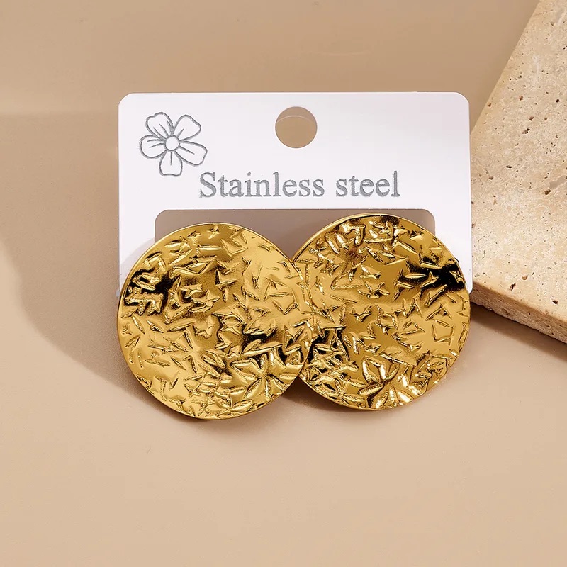 Aretes redondos medianos con textura