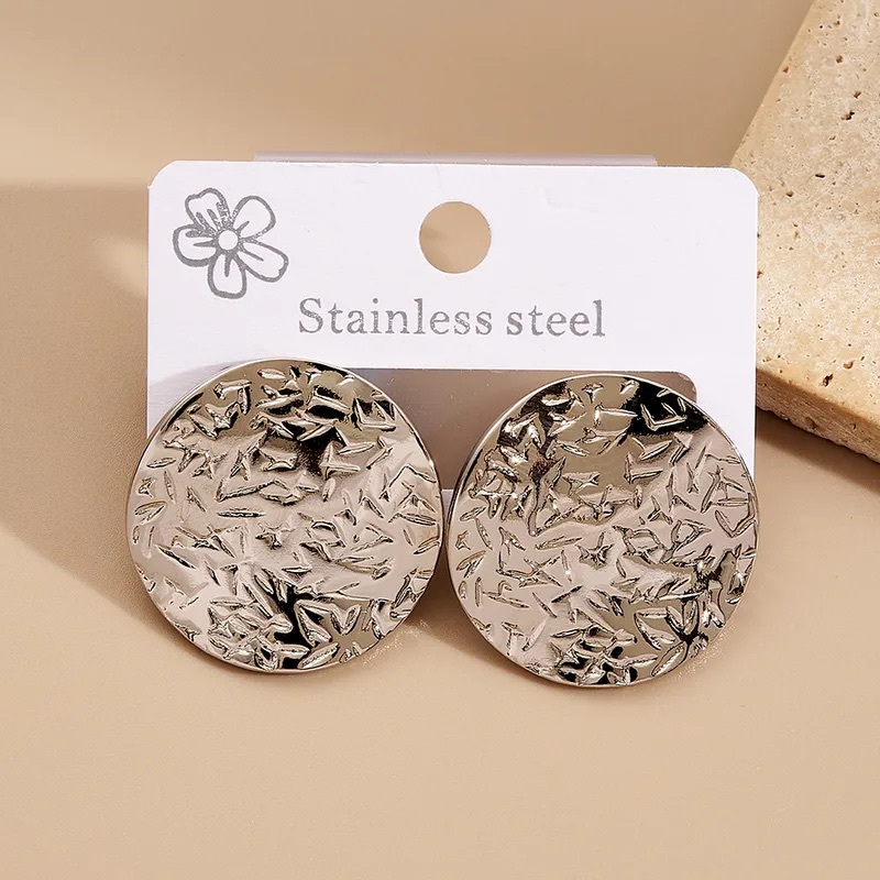 Aretes redondos medianos con textura