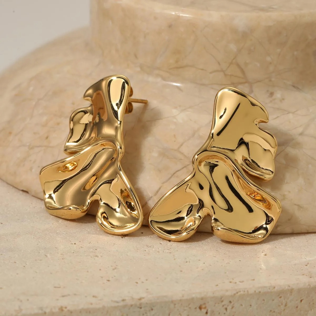 Aretes de media hoja gruesa