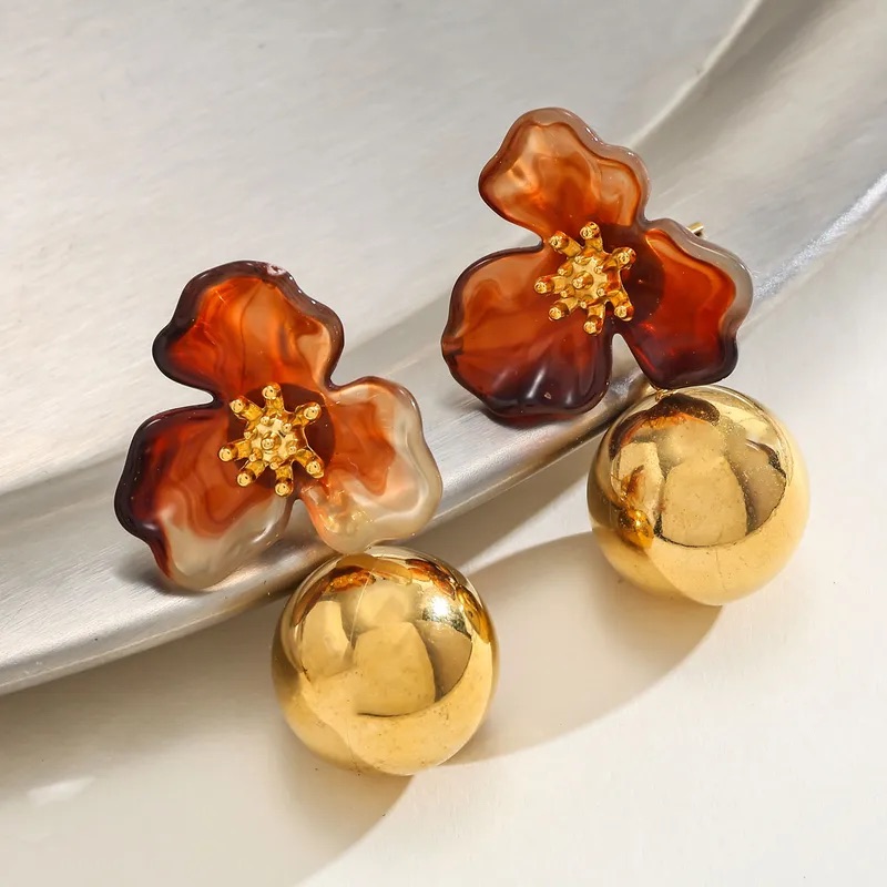 Aretes de perla y flor