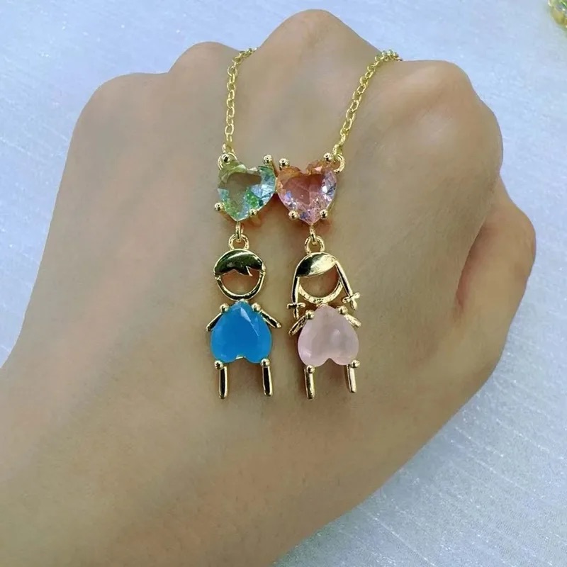 Cadena con dije de Niño y Niña