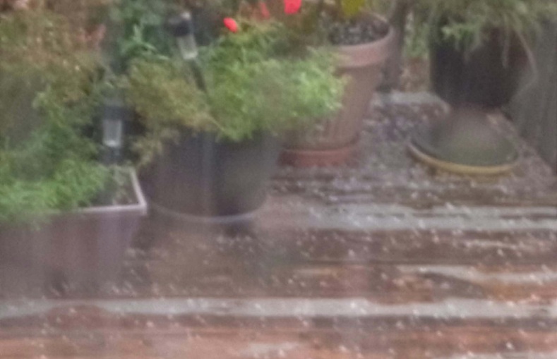 Fierce thunderstorm with hail darkens Durham skies