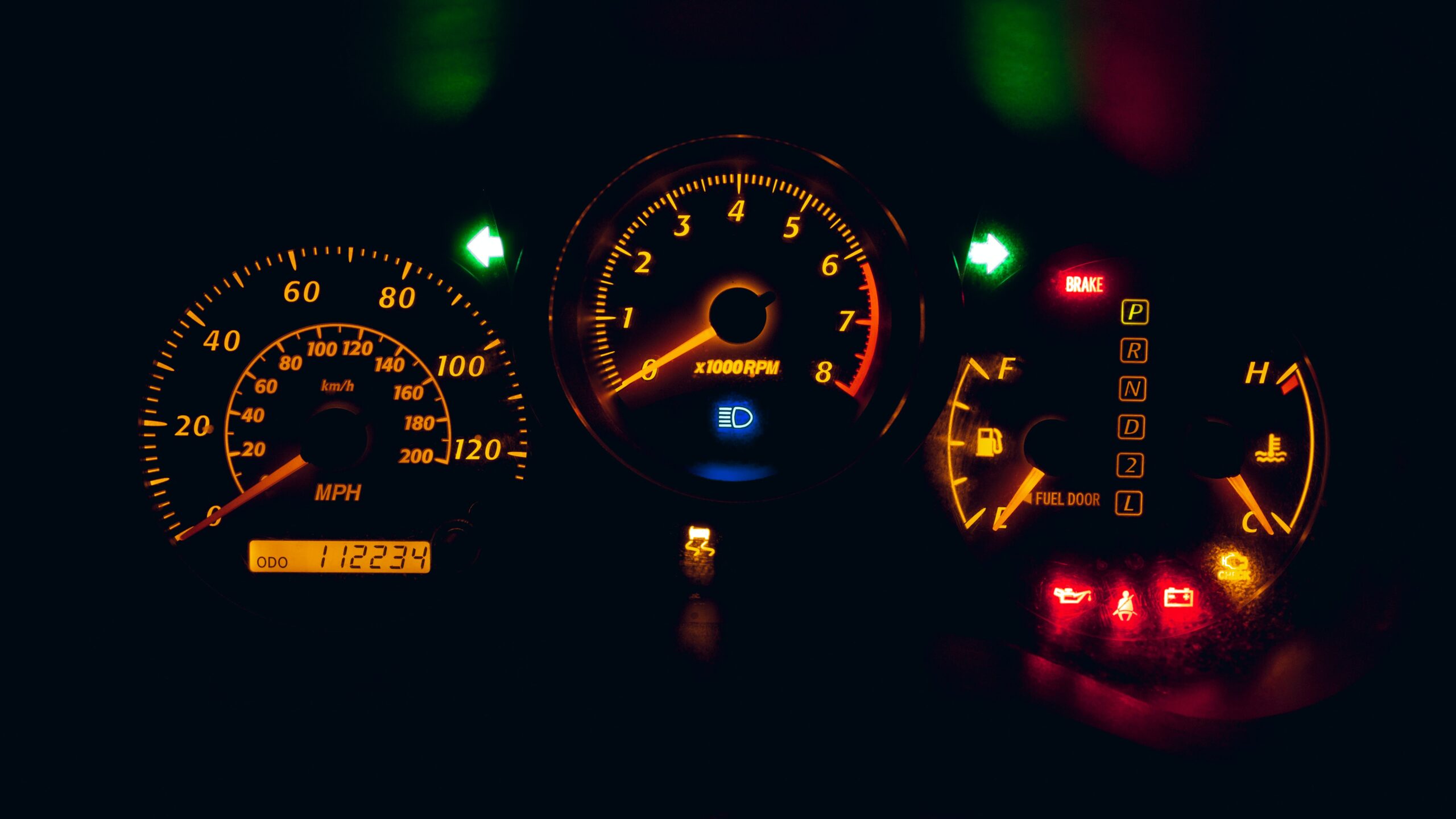 Car Dashboard with Warning Lights On
