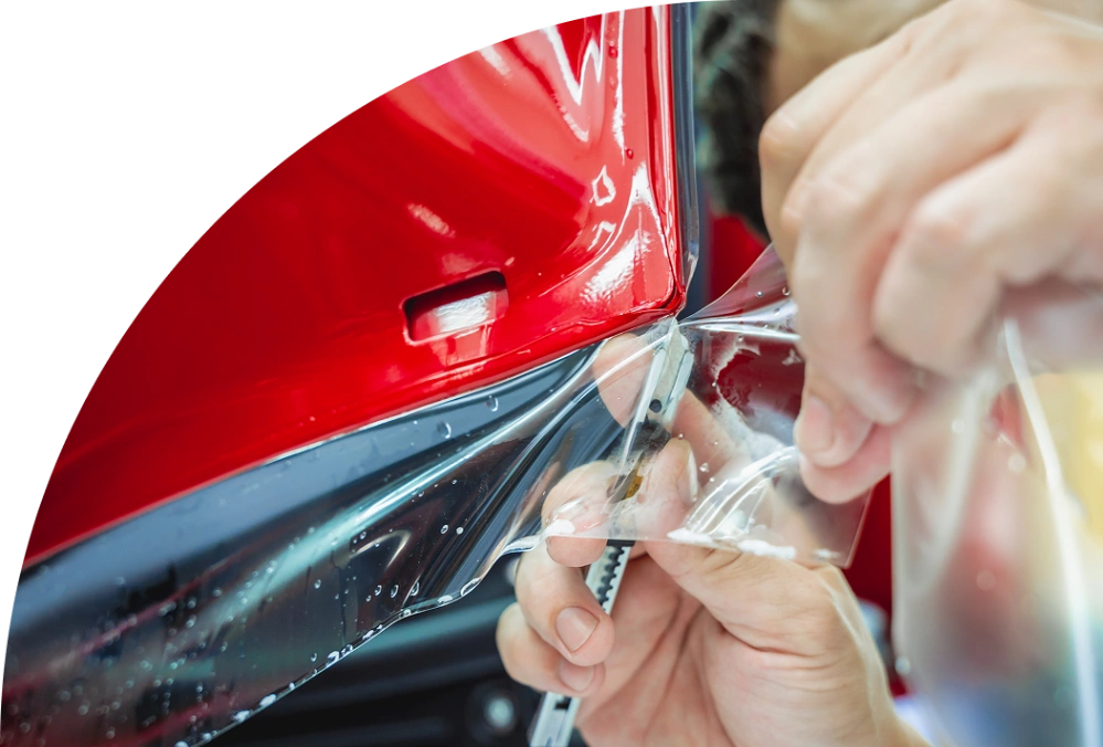 XPEL paint protection film (PPF) on SUV at E1 AutoSpa Houston