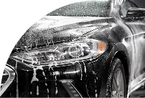 Auto detailing on luxury sedan at E1 AutoSpa Houston