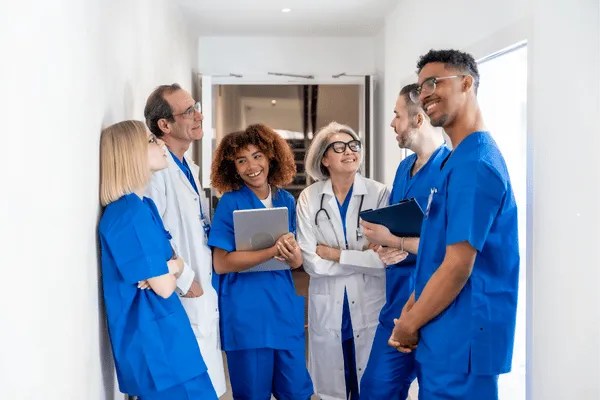 Healthcare professionals beginning successful careers after completing fingerprinting services near me and background checks.