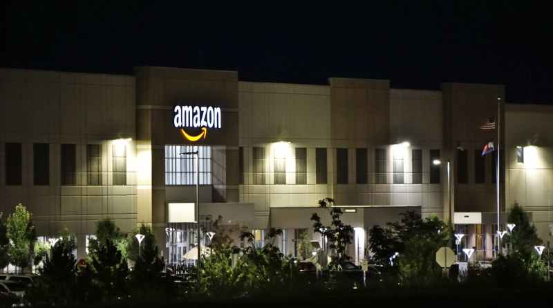 amazon concrete building during nighttime. (How to Make Money with Amazon)