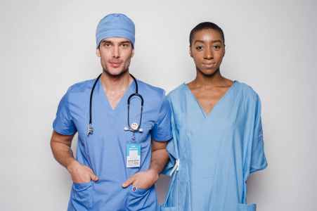 male doctor and female assistant in clinic