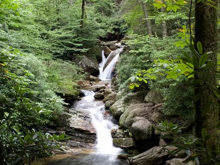 Waterfall hike to skinny dip falls