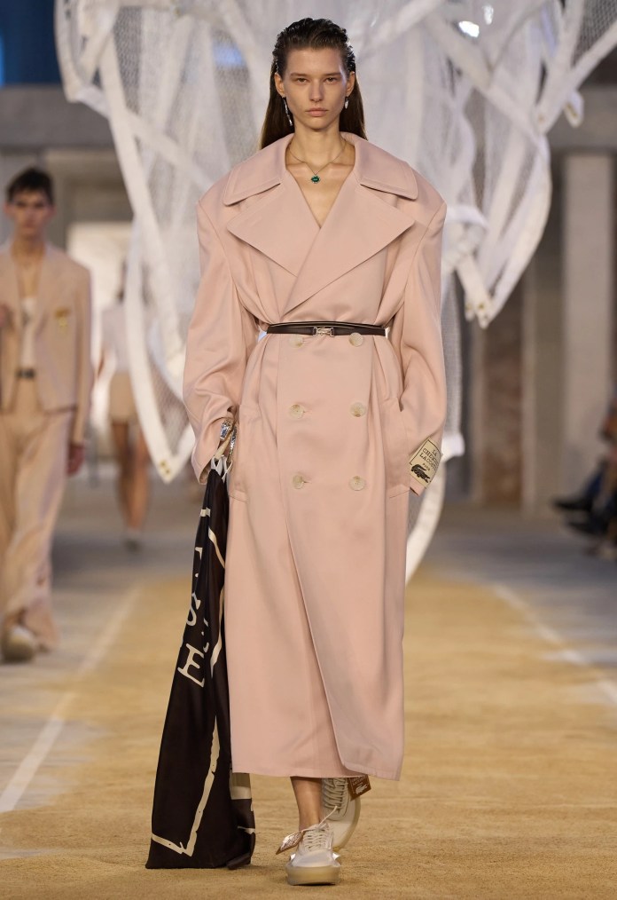 Cropped Trench And Remixed Check Cropped trench in remixed Burberry check with slim tailoring at London Fashion Week