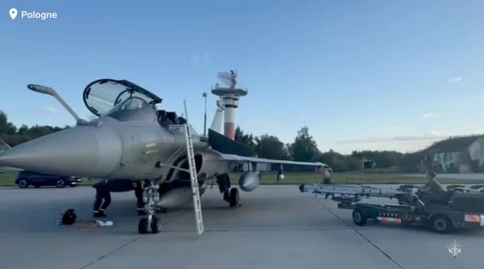Poland Temporarily Closes Airspace Near Lublin And Rzeszow Polish airport information board and grounded aircraft during temporary airspace closure