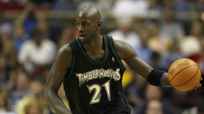 Kevin Garnett In Original Black Trees Kevin Garnett in the original Minnesota Timberwolves black trees uniform during the 2003–04 season.