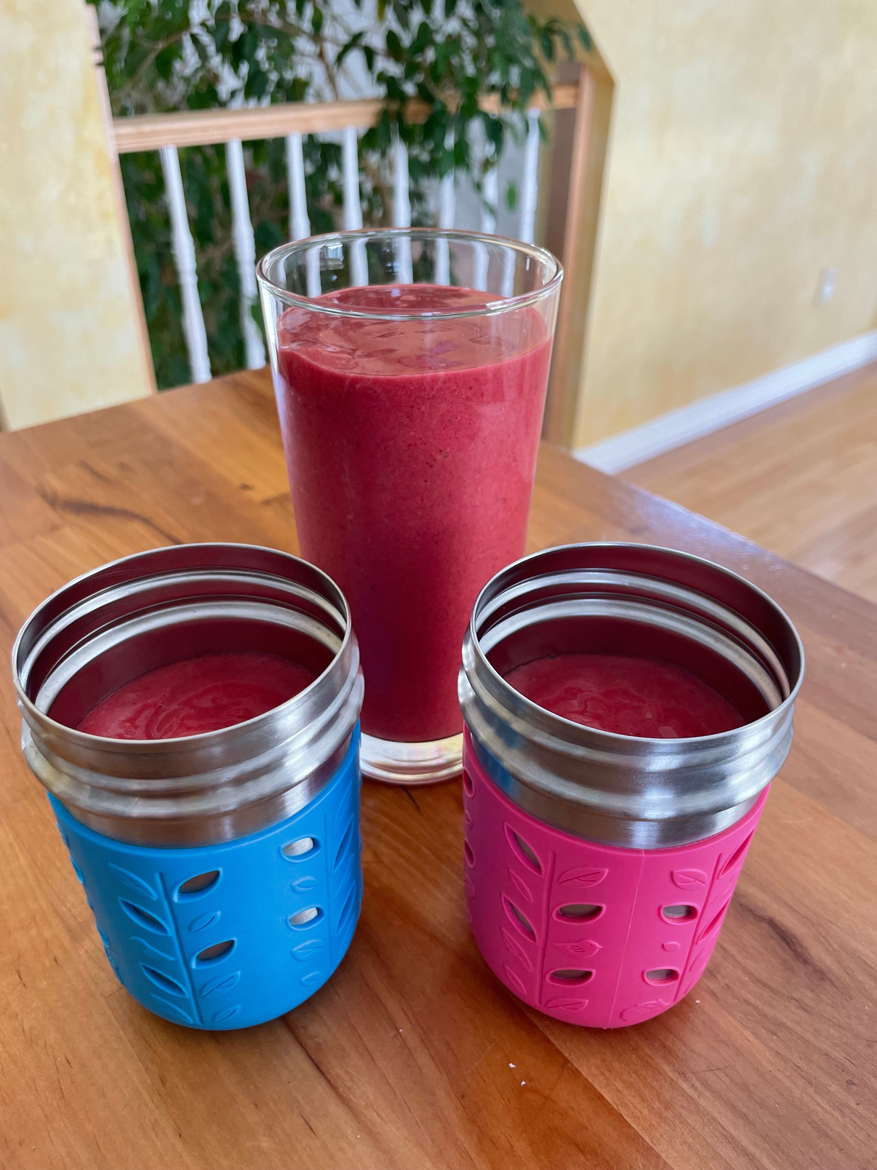 raspberry smoothies - one adult size glass and two glasses for kiddos