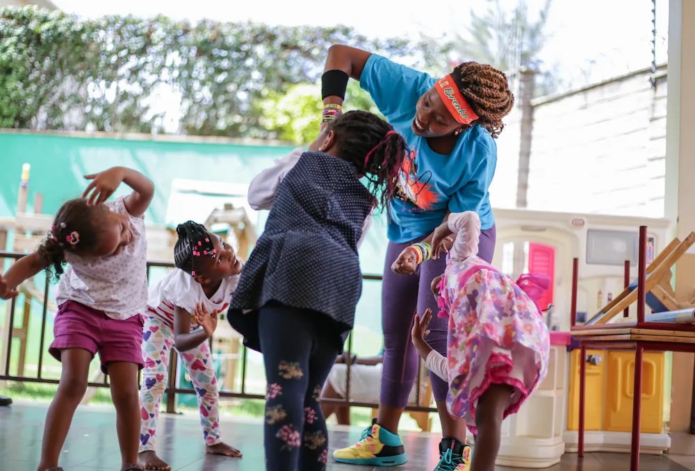 Playgroup Scholars learning break dancing