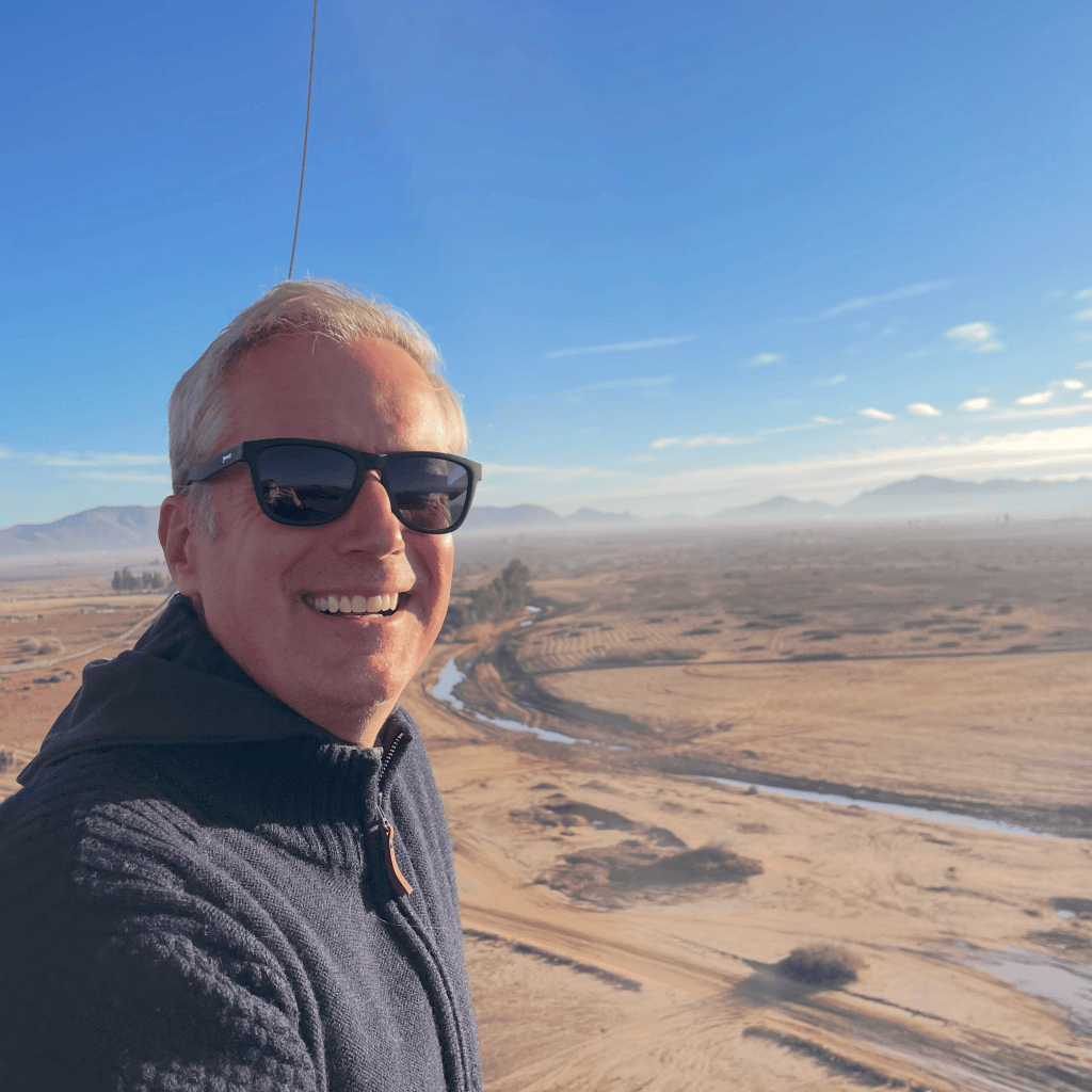 The author in a balloon over the African desert. 