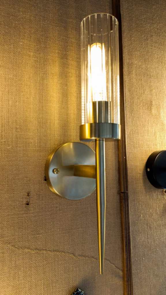Classy wall light on brushed gold finish metallic frame E27