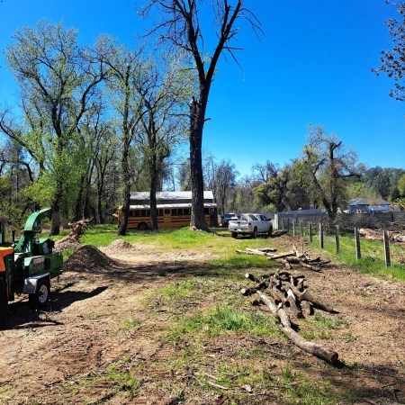 Land cleanup and fire break line installed along a fence line
