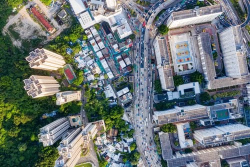 A city is an emergent result of social impact.