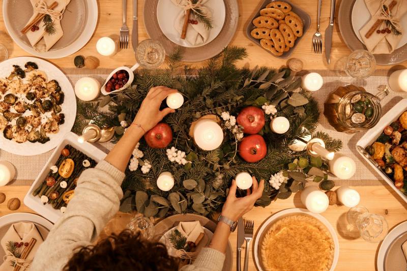 top view of table set up for christmas dinner Photo by Nicole Michalou on Pexels.com