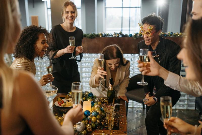 people at a christmas party Photo by Pavel Danilyuk on Pexels.com