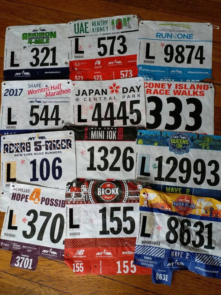 a lot race bibs on the floor