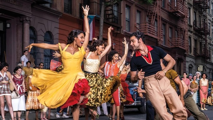 women and men dancing on the street