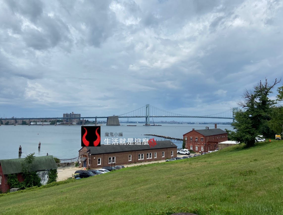 Looking out at a bridge spanning the bay from the hilltop