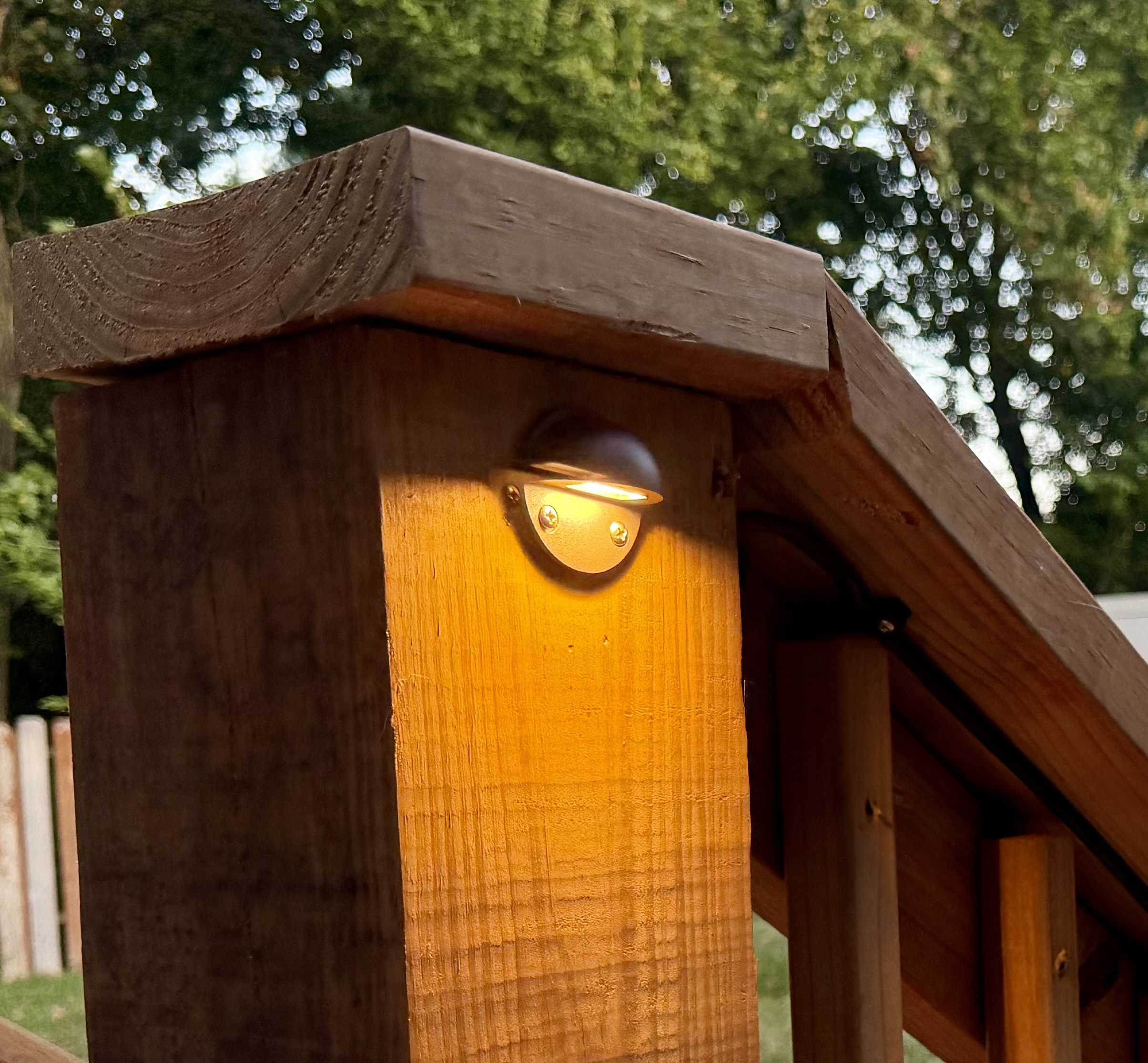 Closeup of deck lighting on railing