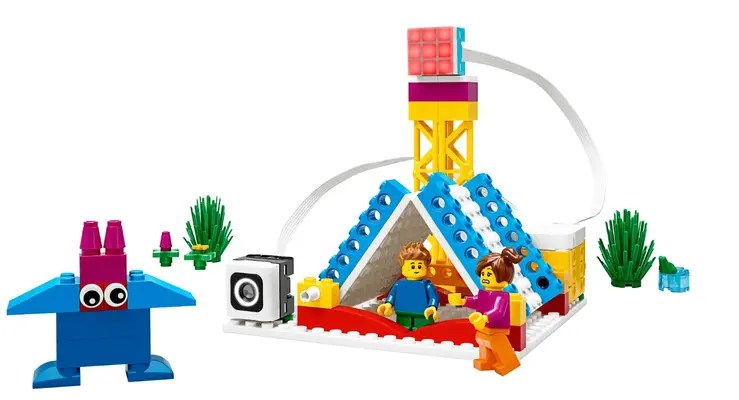 Kids building and coding with LEGO SPIKE Essential educational robotics kit