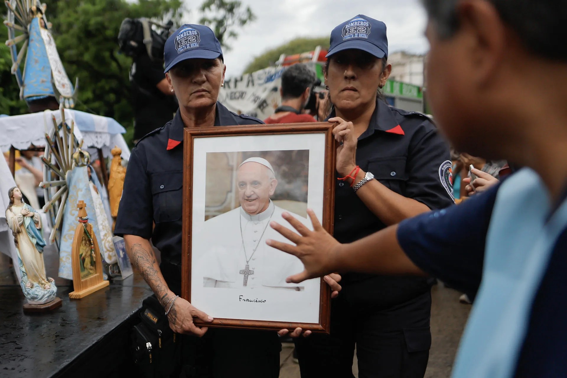(FILE) - People hold an image of Pope Francis during a mass on Monday at Plaza Constitución in Buenos Aires, Argentina. Feb. 23, 2025. EFE/Juan Ignacio Roncoroni
