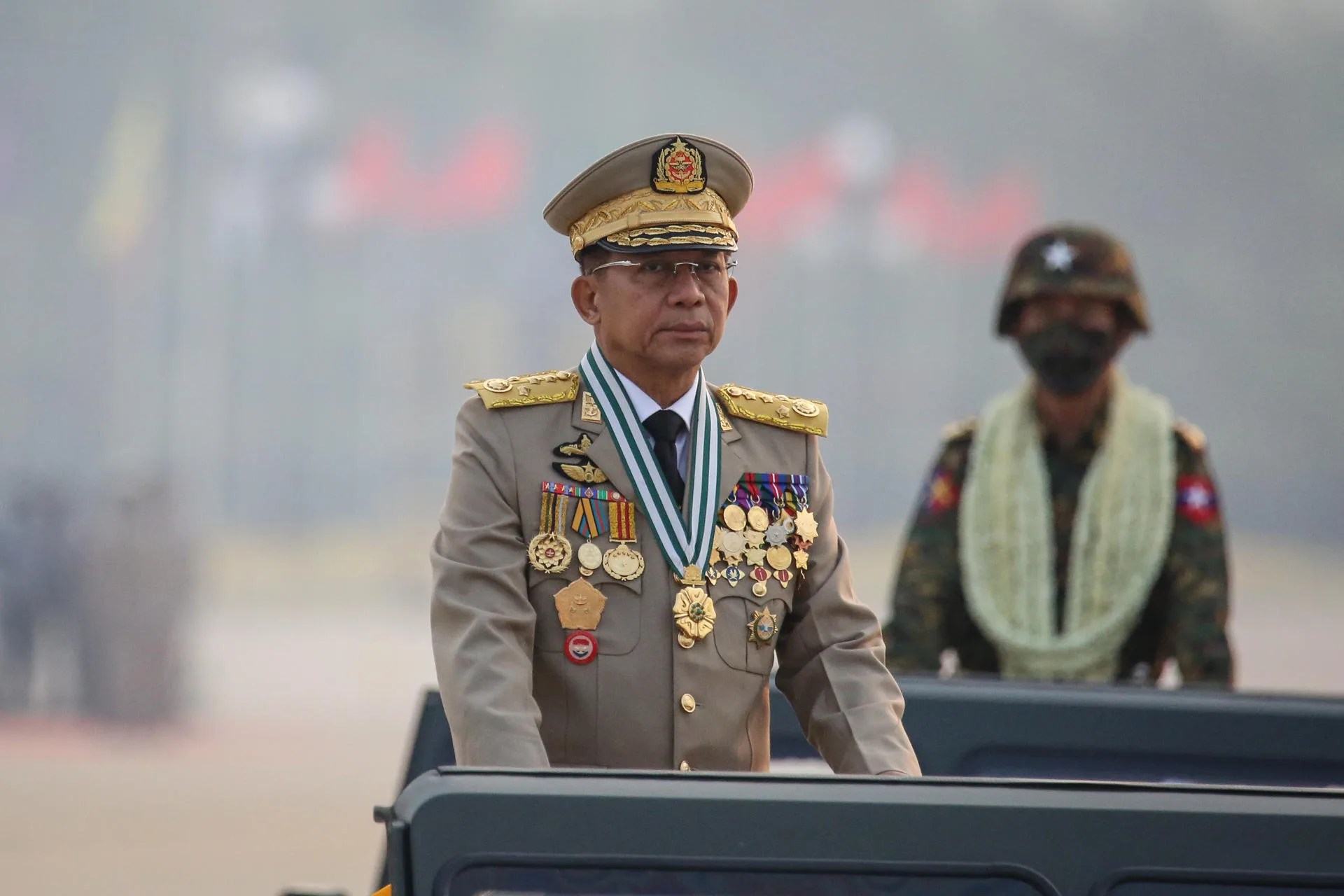 (FILE) Myanmar military Commander-in-Chief Senior General Min Aung Hlaing (L) participates in a parade during the 76th Armed Forces Day in Naypyitaw, Myanmar, 27 March 2021. EPA-EFE/STRINGER