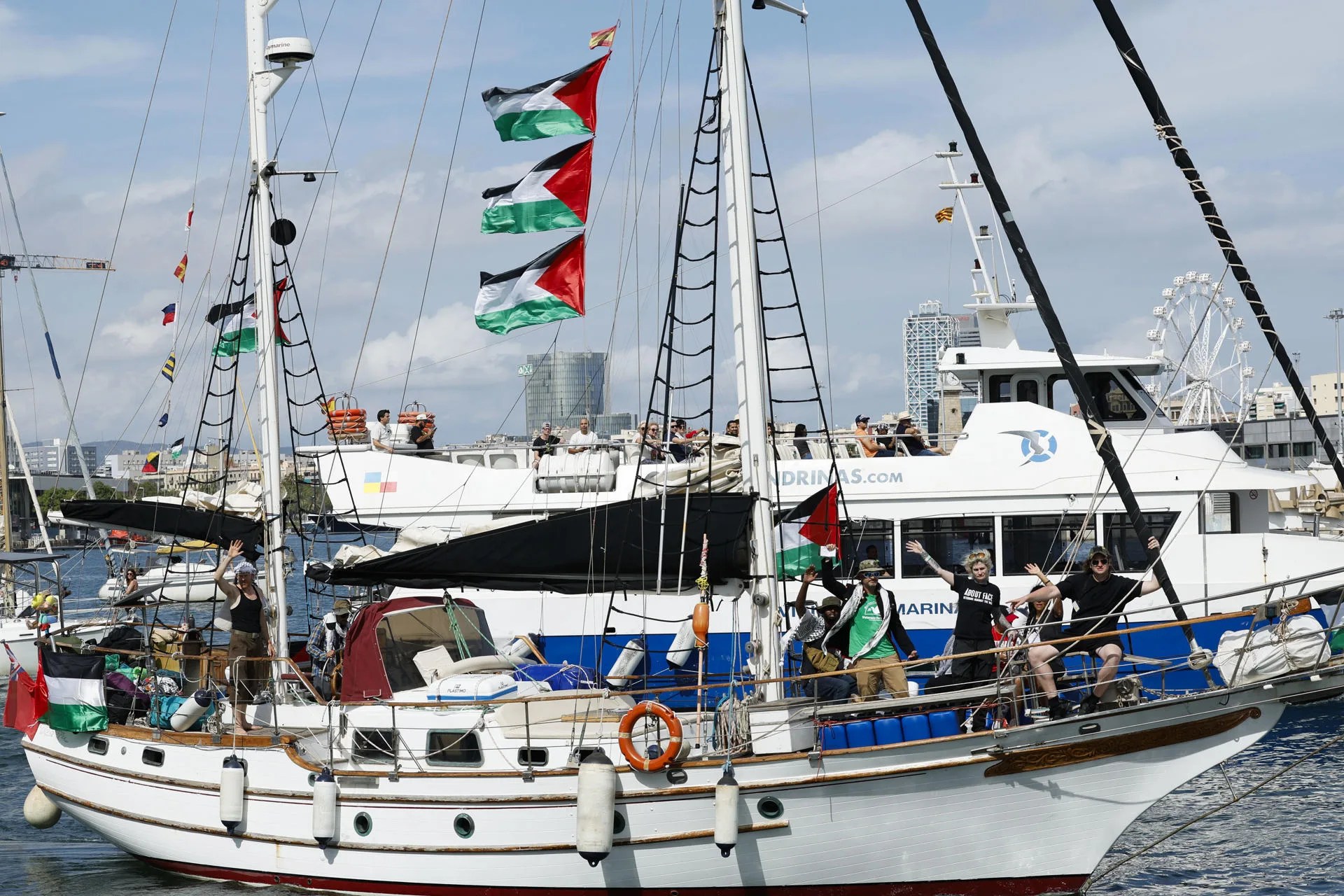 A ship holding Palestinian flags during the departure of the flotilla at the port in Barcelona, northeastern Spain. August 31, 2025. EFE/ Toni Albir