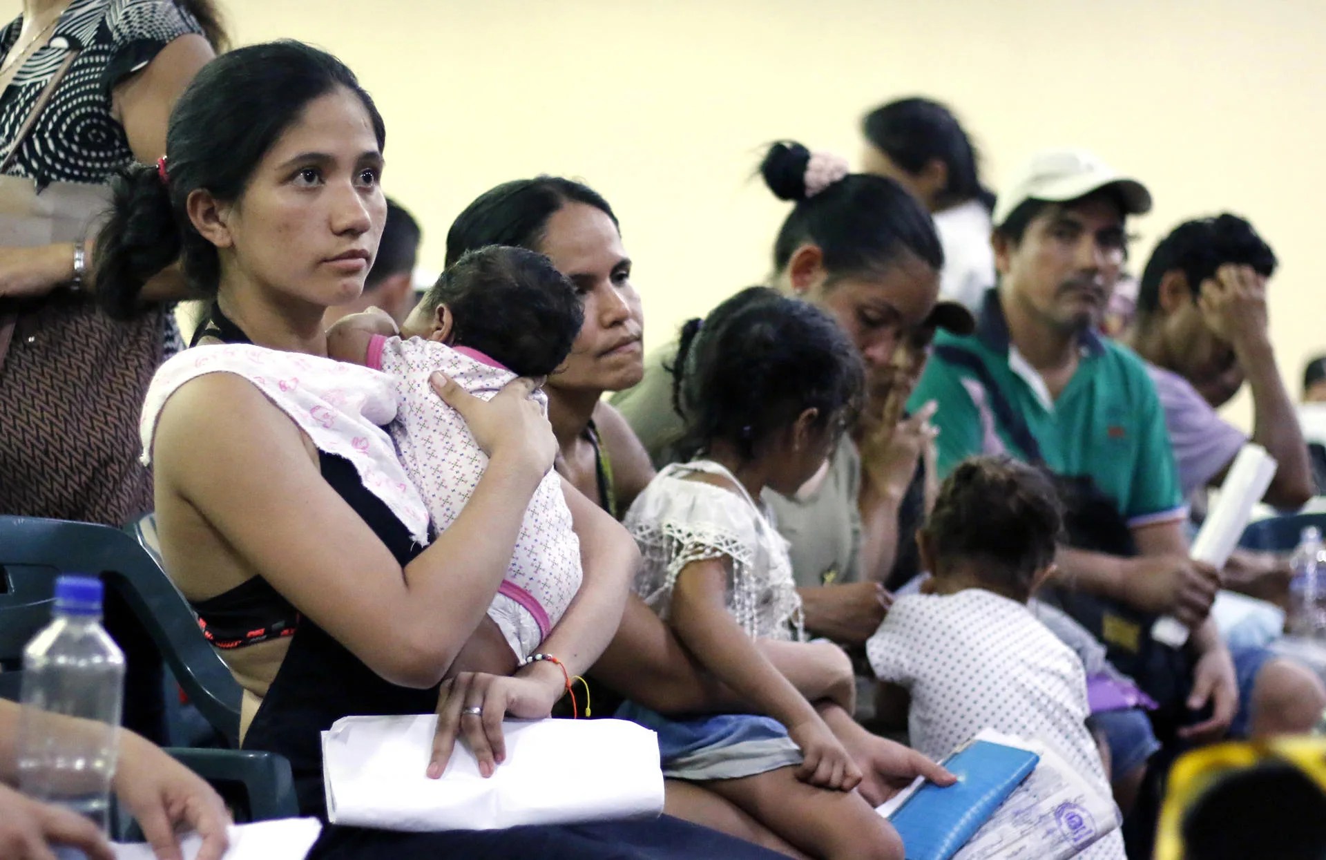 (FILE). Hundreds of Venezuelan families who have fled their country due to economic and political crises queue in the intense sun of the Colombian city of Cúcuta to claim food vouchers provided by the UN World Food Programme (WFP) in border areas. May 03, 2018. EFE/SCHNEYDER MENDOZA