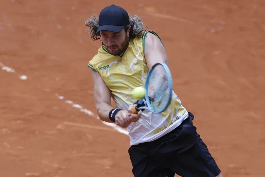 Marco Trungelliti de Argentina en acción contra Daniel Mérida