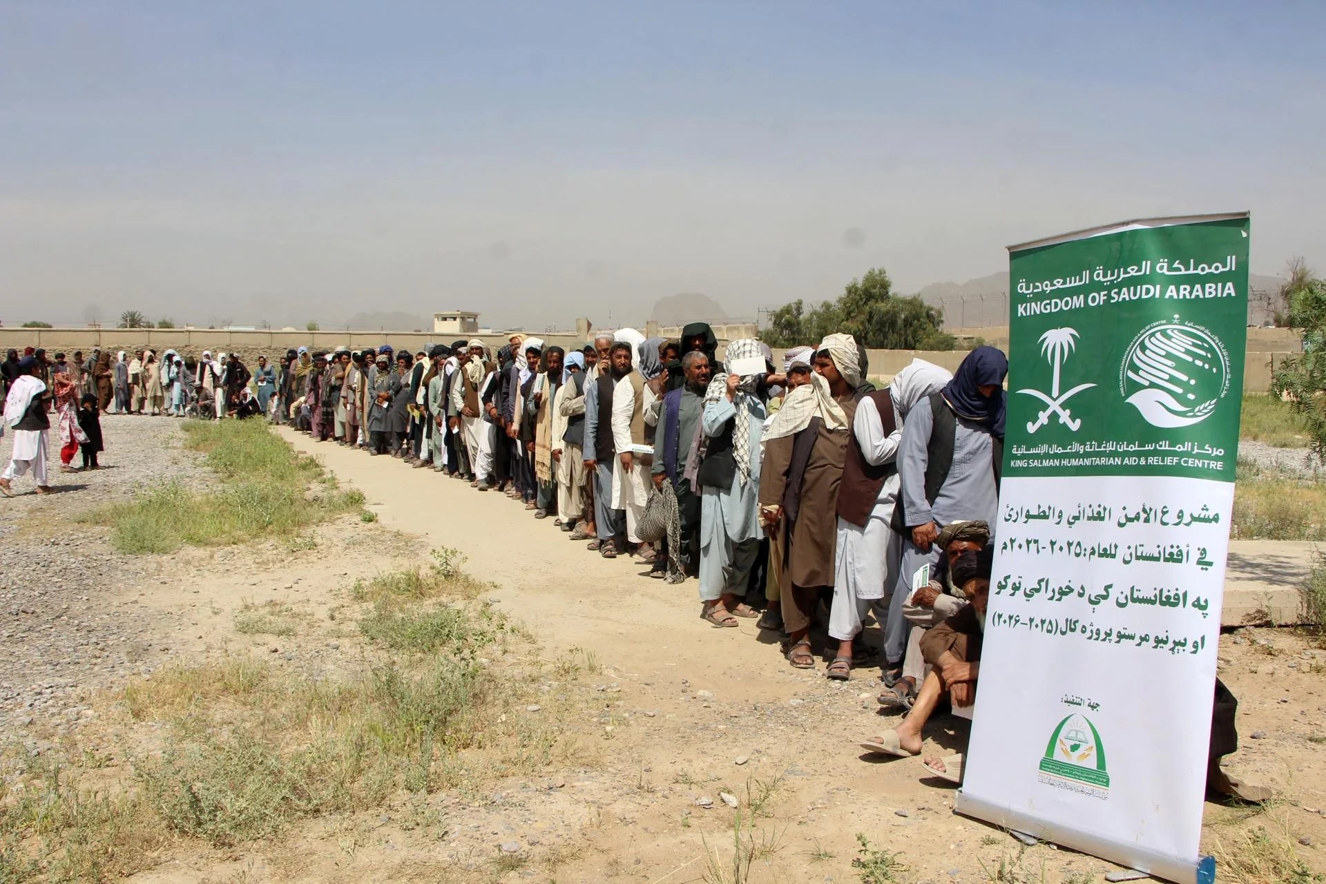 [FILE] Afghan families receive aid donated by the King Salman Charity, in Kandahar, Afghanistan, 26 April 2026. The King Salman Charity Foundation distributed food assistance to 3,000 needy people in Kandahar, aiming to support vulnerable families, internally displaced persons, and returnees, easing hardships and improving living conditions across affected communities there overall. (Afganistán) EFE/EPA/QUDRATULLAH RAZWAN