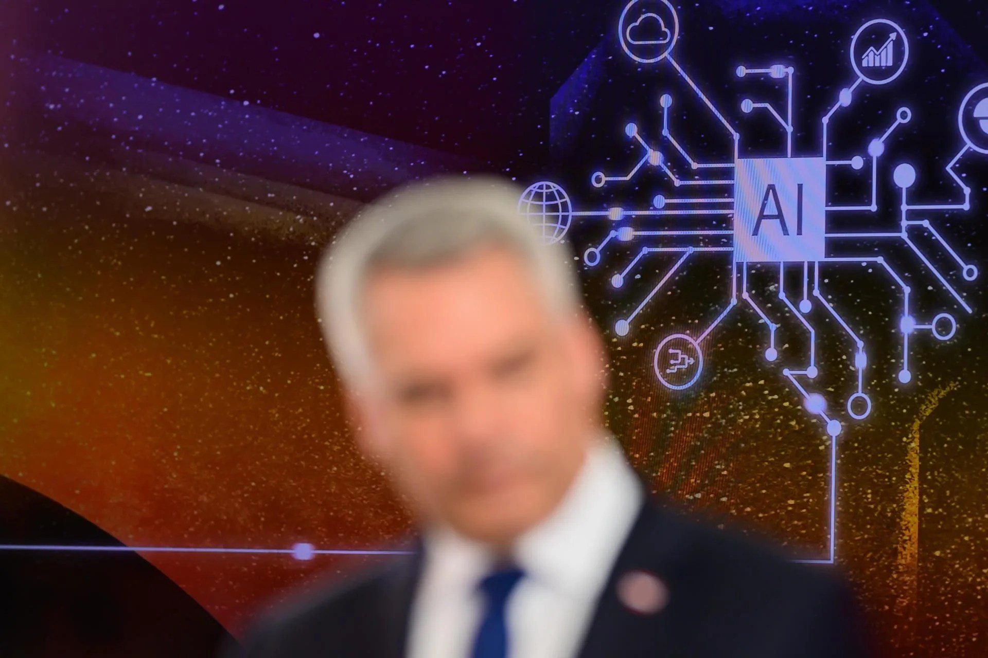 [FILE] Austrian Chancellor Karl Nehammer stands in front of a display reading 'AI' as he attends a press statement during a location summit on 'Impulses for Europe as a business location' organized by the Austrian Government at the headquarters of Austrian photovoltaic manufacturer Fronius International GmbH in Pettenbach, Austria, 14 March 2024. Austrian Chancellor Karl Nehammer points up that it is necessary to reduce energy and production costs, strengthen research and innovation and to cut bureaucracy at national and EU level to support European industry and companies in a market competition with the US, China and Latin America. EFE/EPA/CHRISTIAN BRUNA