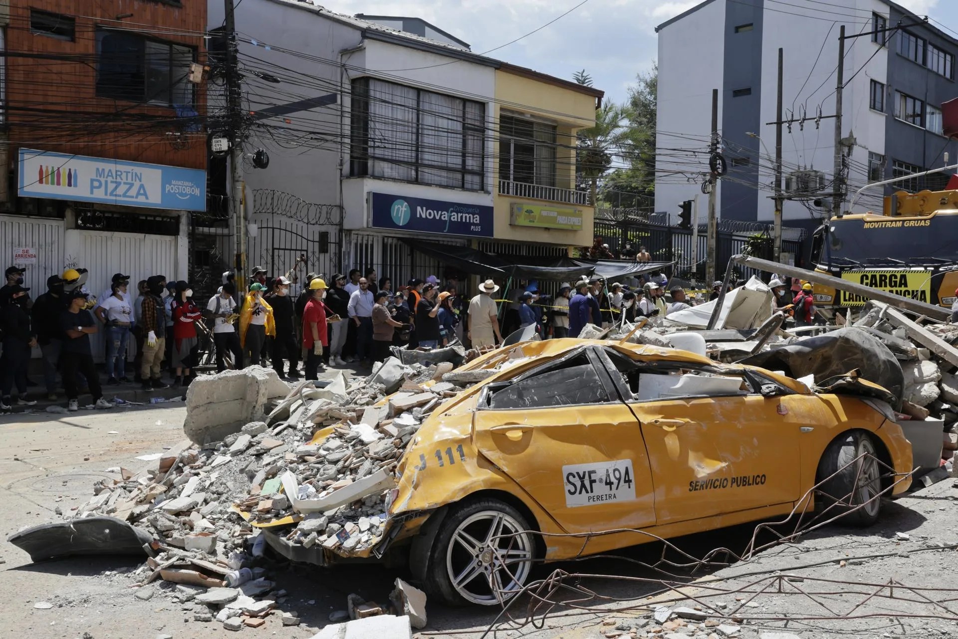 Photograph showing a vehicle damaged by building debris following the 7.4 magnitude earthquake that struck most of Colombia, in the La Lorena sector of Pereira, Colombia, 11 August 2026. EFE/Carlos Ortega