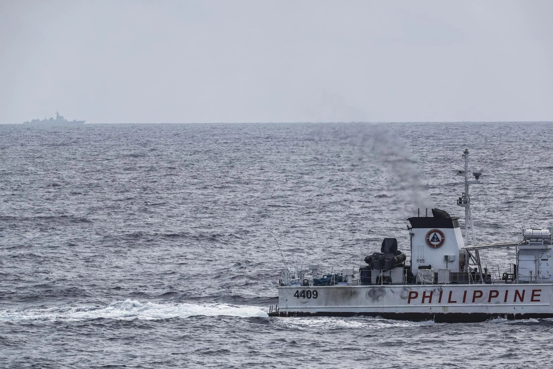 (FILE) A Chinese naval vessel in disputed waters of the South China Sea (referred also as the West Philippine Sea) off the coast of Zambales province, Philippines, 04 June 2025. EFE/EPA/ROLEX DELA PENA