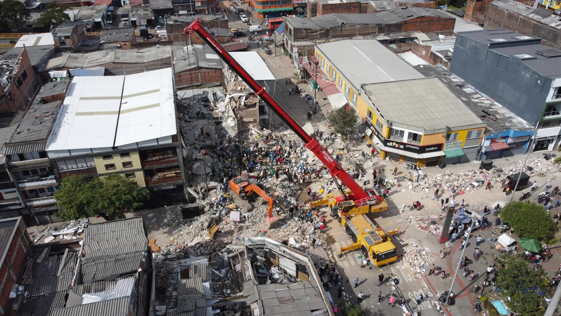 Aerial photograph showing rescue workers conducting search operations at the site where a four-story building collapsed following the 7.4-magnitude earthquake that shook most of Colombia last Monday, in the La Libertad Park area of Pereira, Colombia. Aug. 12, 2026. EFE/ Carlos Ortega