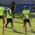 Los jugadores del Atlético de Madrid, Julián Alvarez (d) Cristian Cuti Romero (c) y el mexicano Obed Vargas, durante el entrenamiento
