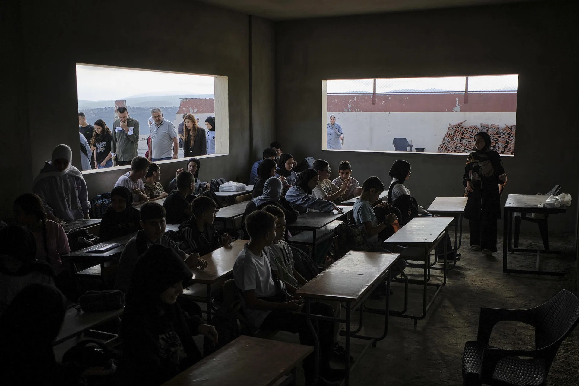 As children return to classrooms in southern Lebanon, the sound of school bells competes with Israeli artillery fire, while damaged schools, overcrowded classrooms and trauma from months of conflict threaten the future of thousands of students. EFE/ Edgar Gutiérrez